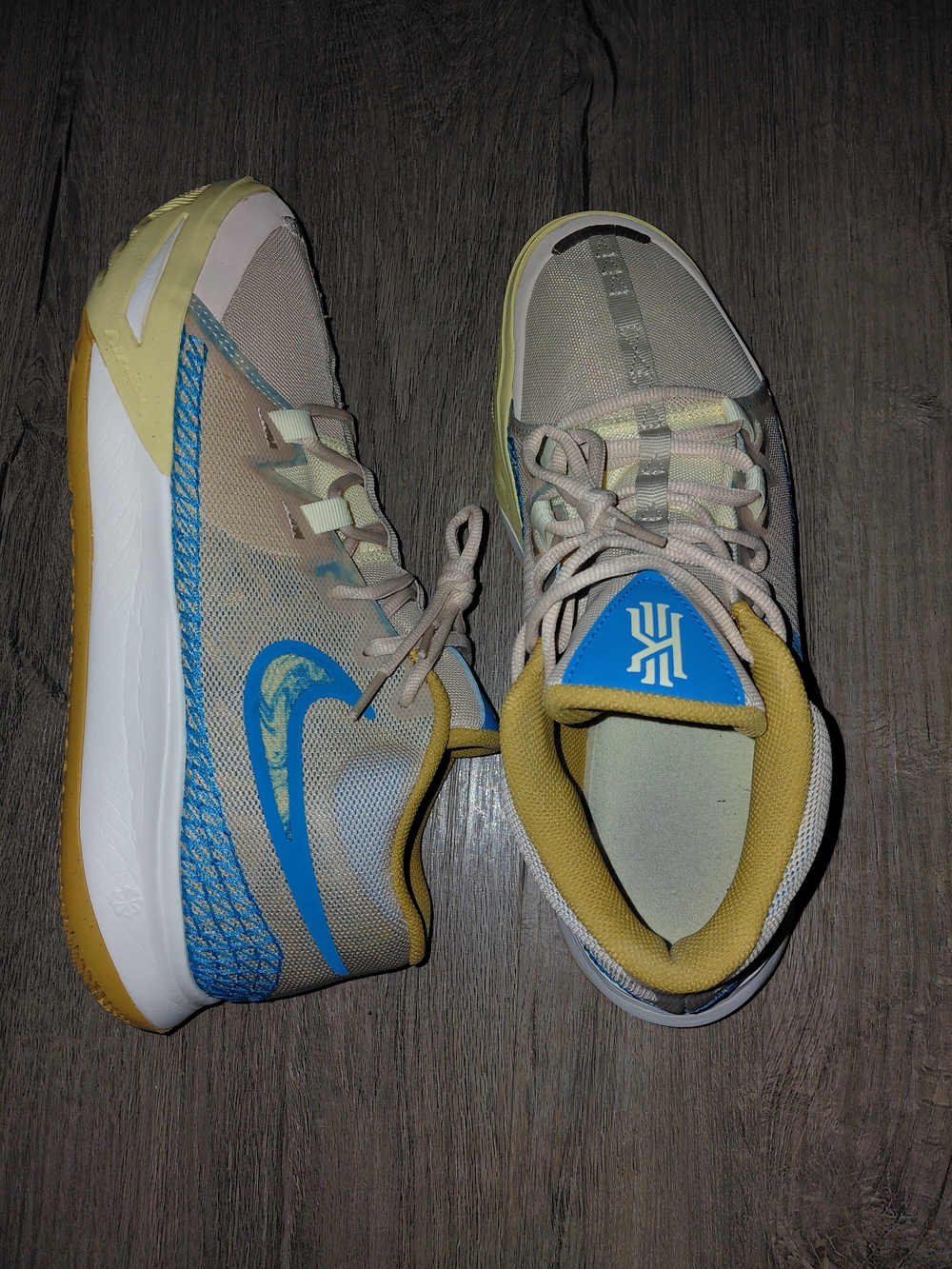Nike Kids Beige and Blue Athletic Sneakers with Yellow Accents